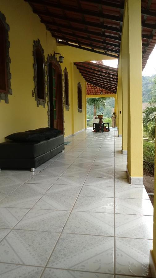 Casa Com Flores Pedra Azul  Bagian luar foto
